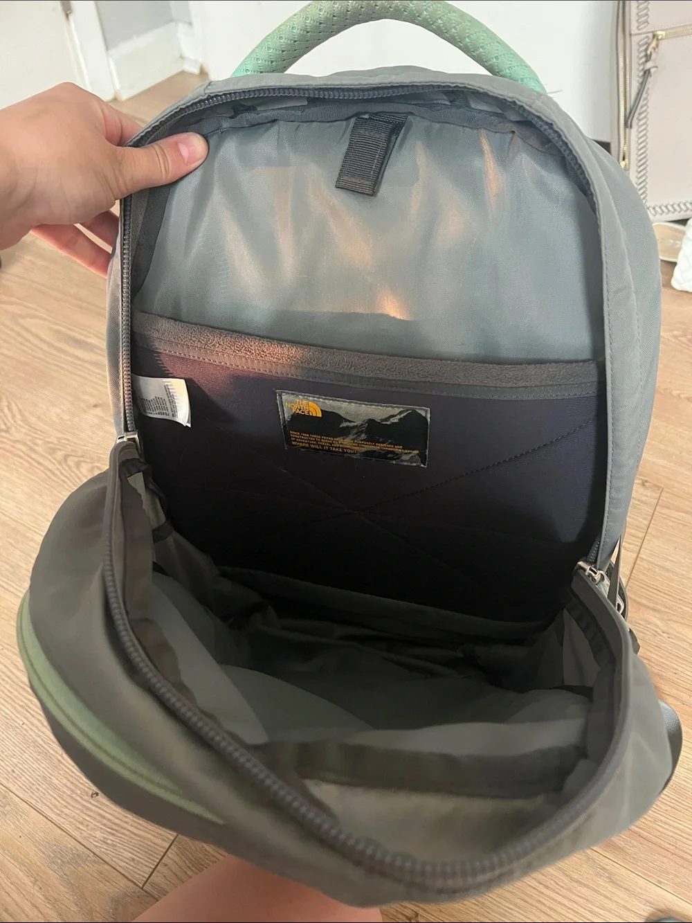 The North Face Gray Backpack with Mint Accent